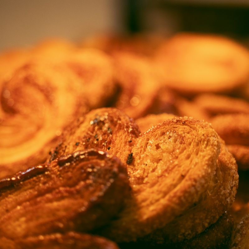 Caramelised cinnamon palmier pastries with flaky layers